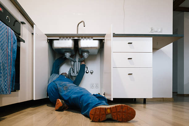 Professional Drain Cleaning technician working in Hightstown, NJ